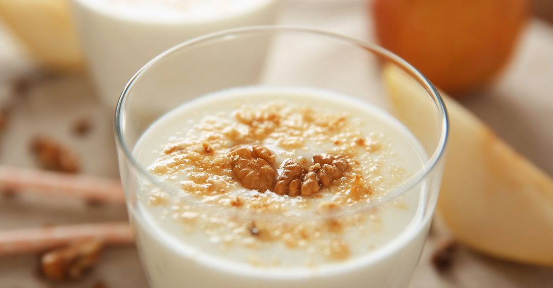 HONEY CREAM WITH ROASTED WALNUTS AND MINT LEAVES